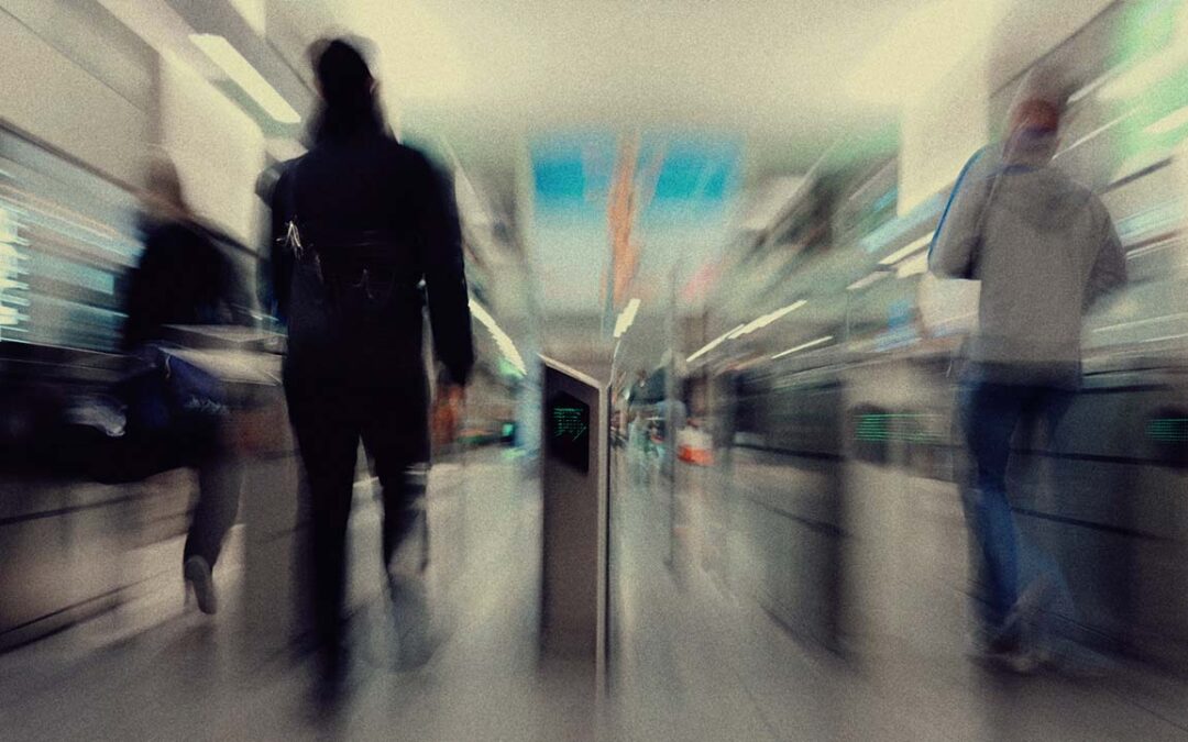 Passengers speeding through airport gate